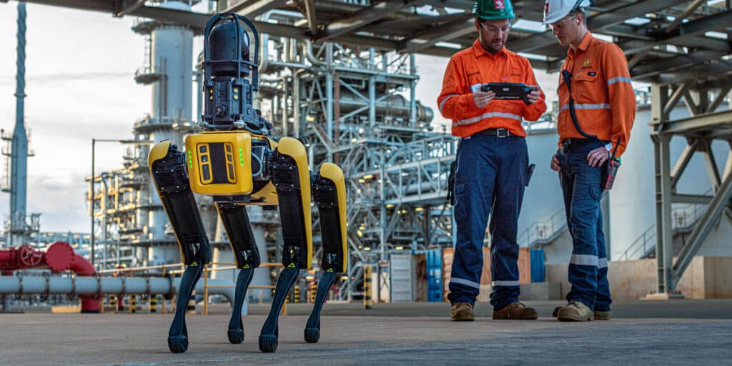 Operators drive Spot through an oil refinery using the tablet controller