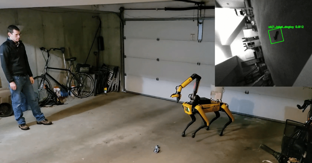 An engineer in his garage with Spot