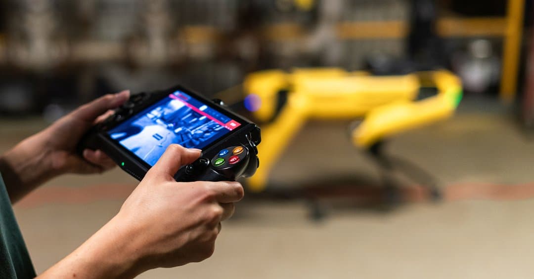 An operator programs an autonomous mission from the Spot tablet controller