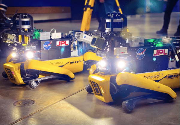 Two Spot robots with custom autonomy and AI payloads designed by NASA
