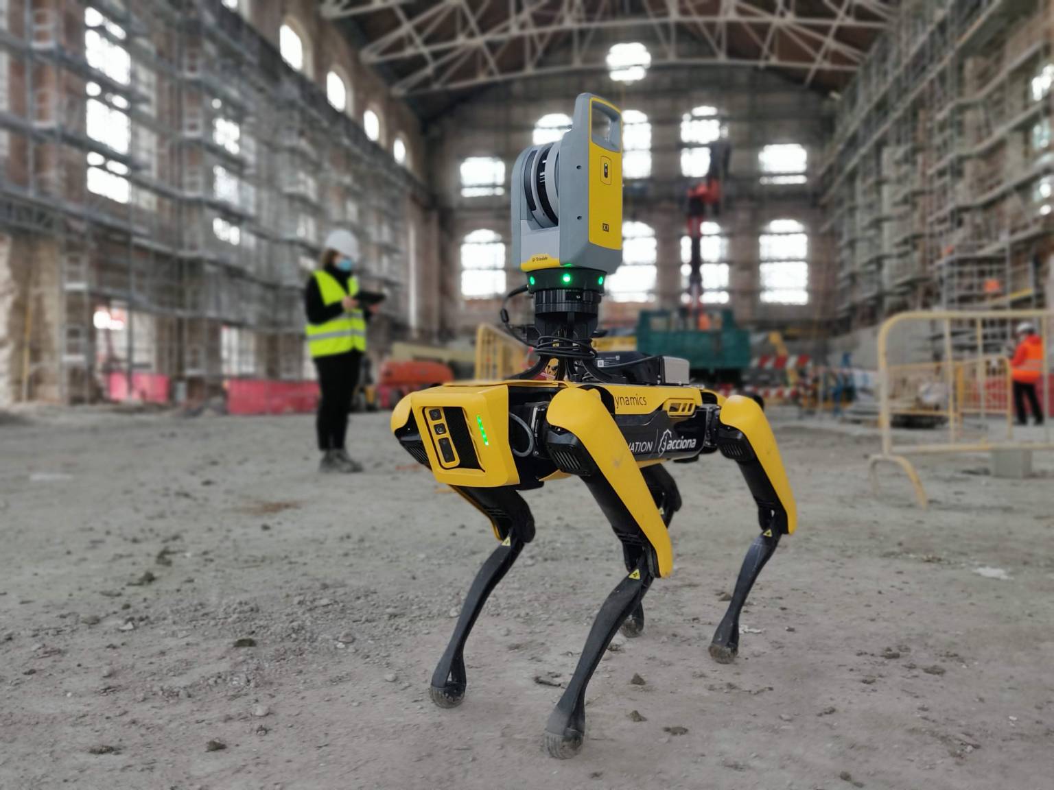 Spot at a construction work site with a laser scanning payload