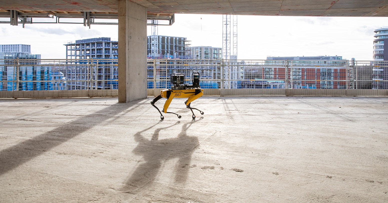 Spot with a laser scanning payload at an urban construction site