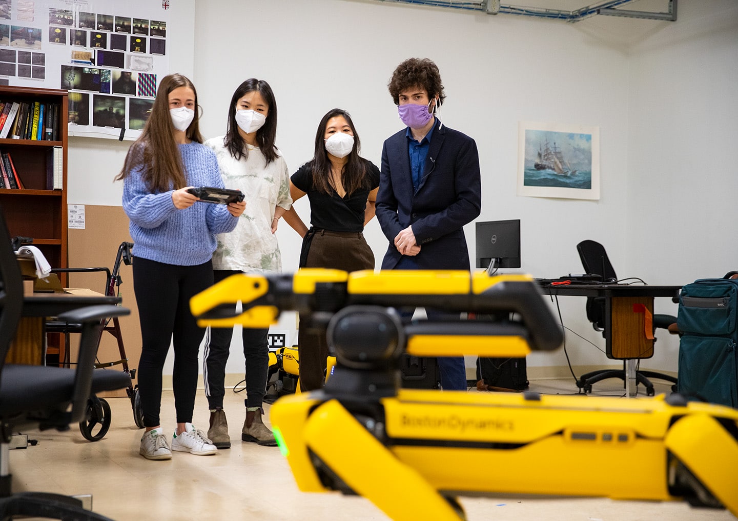 Students drive Spot in a robotics classroom