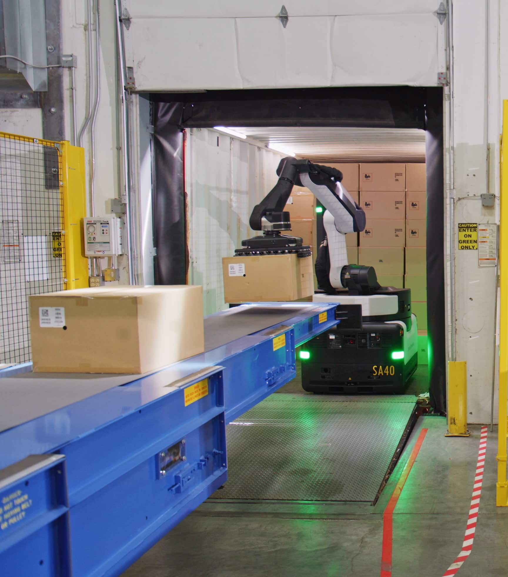 A Stretch robot unloads freight at an inbound logistics facility