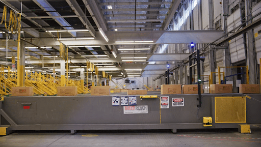 packages move along a conveyor belt